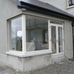 Drumanphy Rd Portadown Cream pvc french doors with fanlight and fixed corner window.