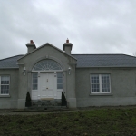 Cusheny Rd Portadown Whitefoil sliding sash windows with internal georgian grid and timber front door.