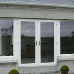 Cusheny Rd Portadown Pvc whitefoil french doors and fixed sidelights.