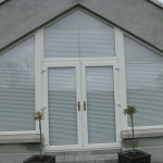 Cusheny Rd Portadown Pvc whitefoil french doors and fixed angle windows.